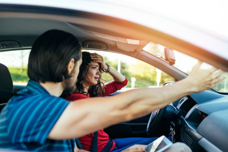 Anxious woman in a car accident