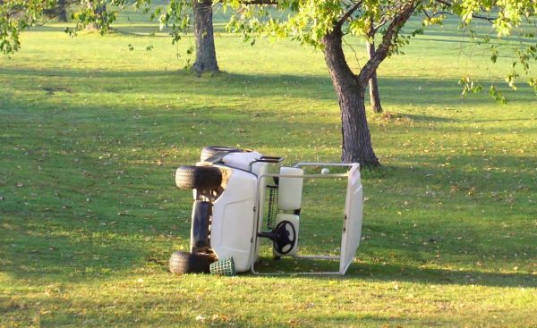 tipped golf cart