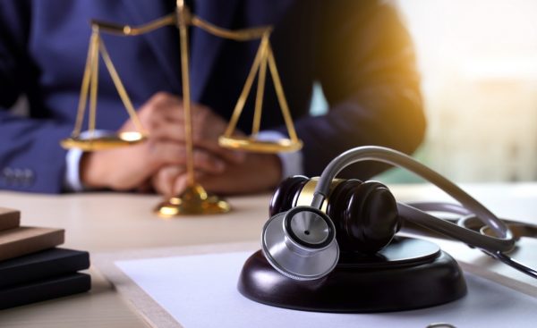 lawyer at desk w gavel